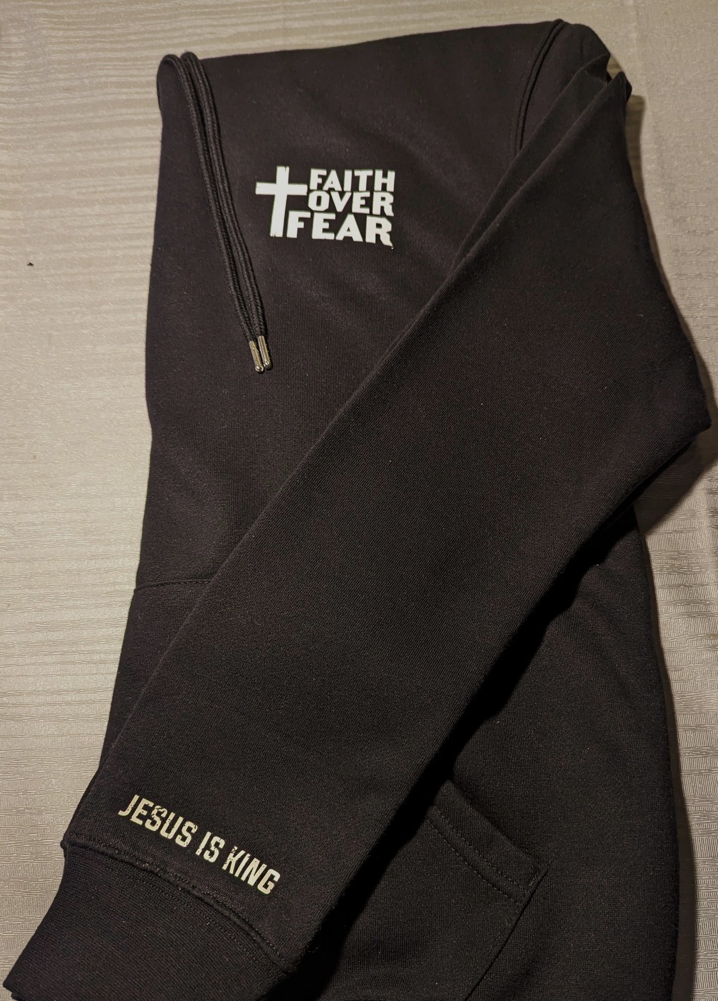 Black hoodie. Faith Over Fear|Jesus is king