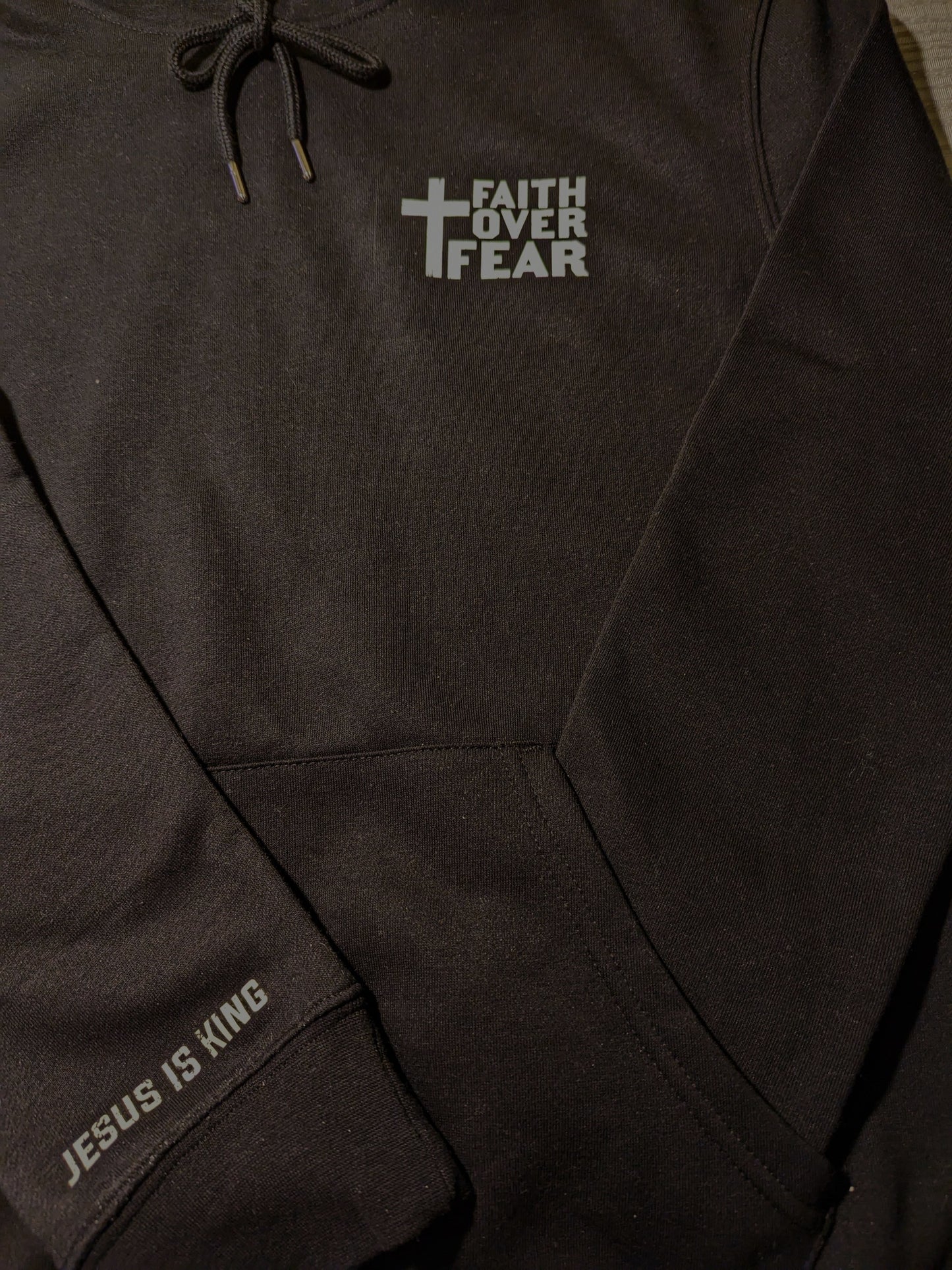 Black hoodie. Faith Over Fear|Jesus is king